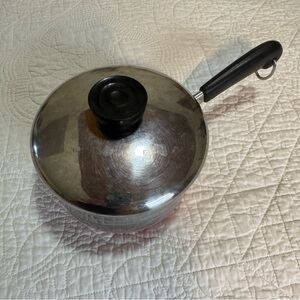 Revere Ware Silver 1 quart Saucepan with Black Handle and lid